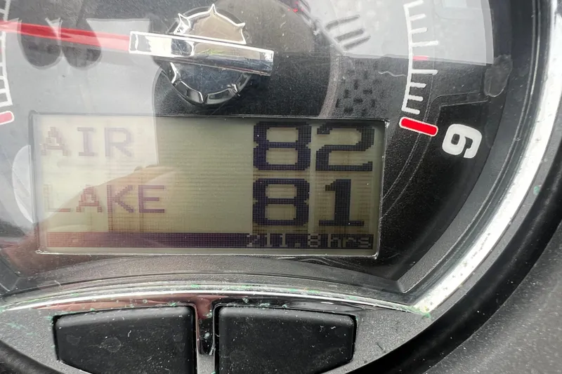 Slide: The Image of Close-up of 2016 Axis T22 gauge displaying air and lake temperatures. - 8
