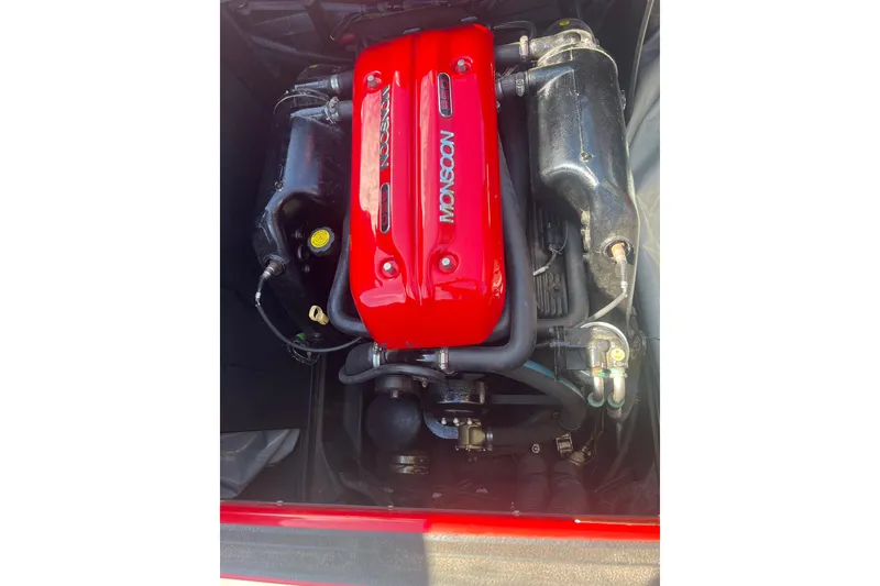 Slide: The Image of 2016 Axis T22 boat engine with red Monsoon cover, detailed view. - 9