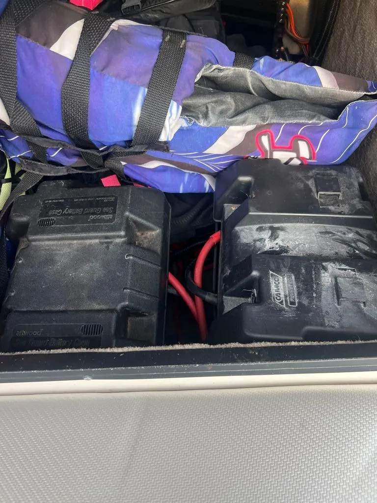 Slide: The Image of Batteries and gear in 1997 Malibu Sunsetter LX boat. - 13