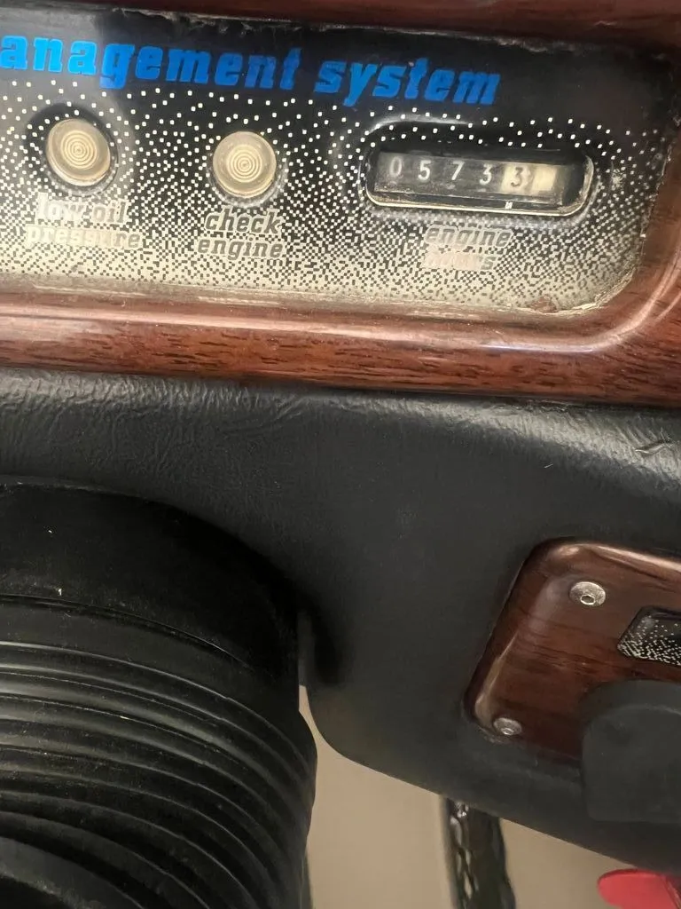 Slide: The Image of Dashboard of a 1997 Malibu Sunsetter LX with odometer. - 9