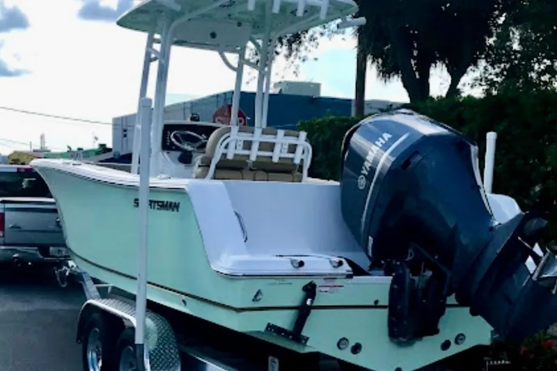 The Image of 2018 Sportsman Heritage 231 Center Console boat with Yamaha engine on trailer. - 0