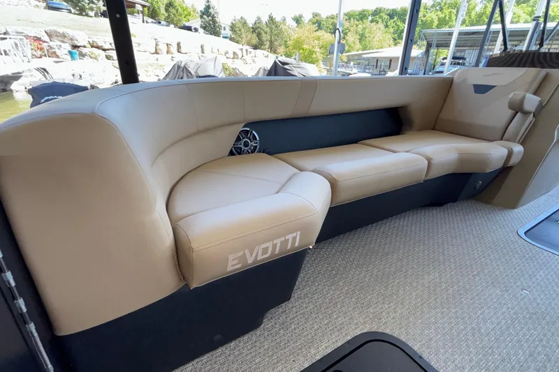 Slide: The Image of Luxurious seating on 2026 Evotti 525QL boat, featuring beige upholstery and modern design. - 11