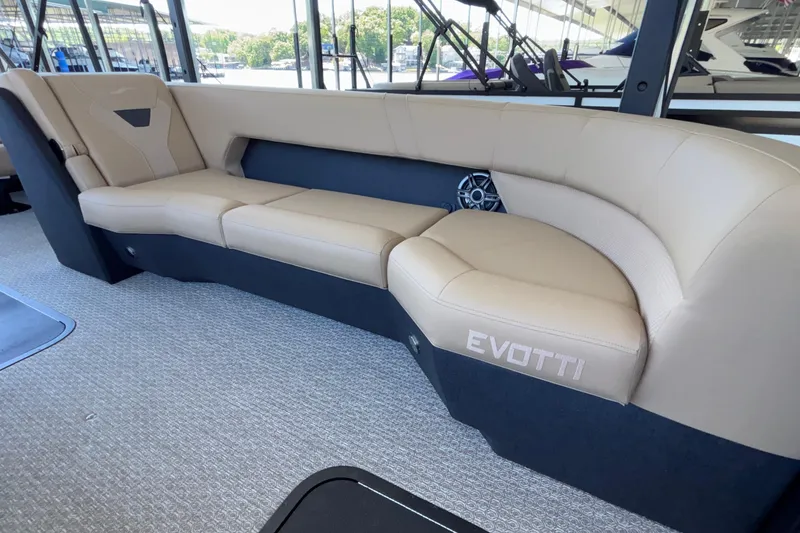 Slide: The Image of Luxurious seating in the 2026 Evotti 525QL boat, featuring beige upholstery and modern design. - 12