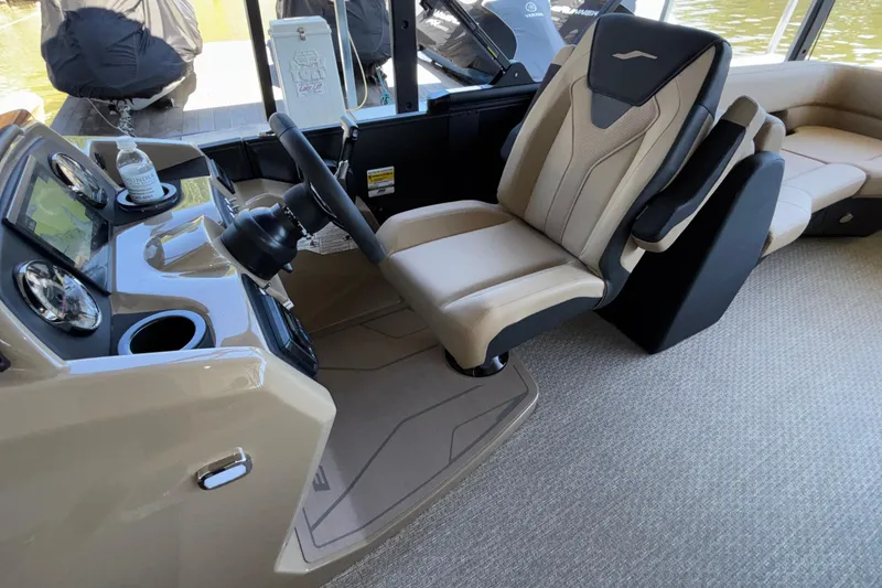 Slide: The Image of 2026 Evotti 525QL boat interior with modern helm and comfortable seating. - 16
