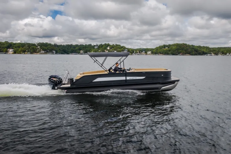 Slide: The Image of 2026 Evotti 525QL pontoon boat cruising on a lake under cloudy skies. - 65