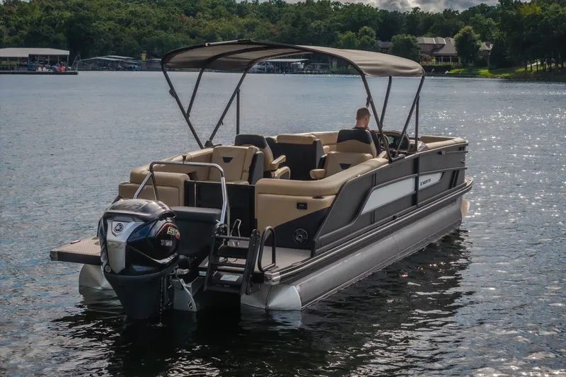Slide: The Image of 2026 Evotti 525QL pontoon boat on a serene lake with lush greenery. - 45