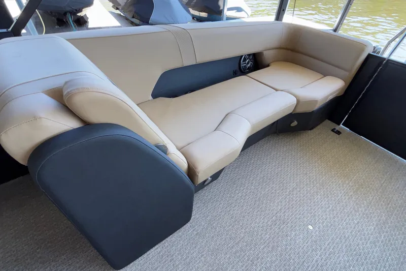 Slide: The Image of Luxurious seating in the 2026 Evotti 525QL boat, featuring beige upholstery and modern design. - 26