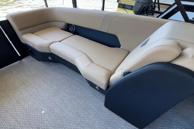 Slide: The Image of Luxurious seating in the 2026 Evotti 525QL boat, featuring beige upholstery and modern design. - 27