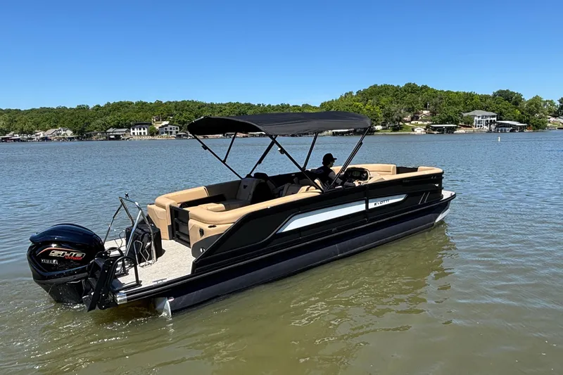 Slide: The Image of 2026 Evotti 525QL pontoon boat on a lake, featuring a Yamaha engine. - 3