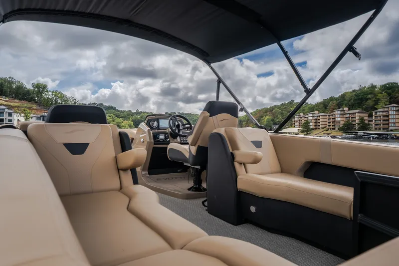 Slide: The Image of Luxurious interior of 2026 Evotti 525QL boat with beige seating and modern dashboard. - 48