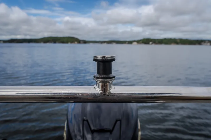 Slide: The Image of Evotti 525QL boat detail with scenic lake view, 2026 model. - 56