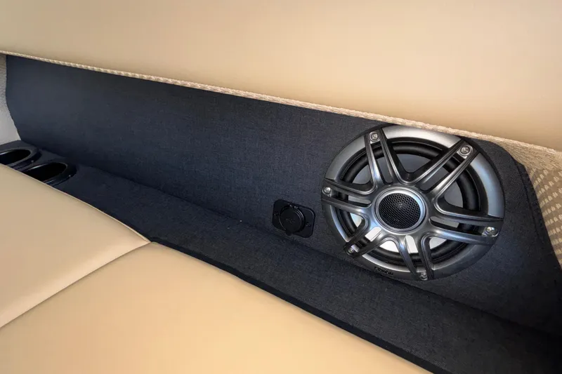 Slide: The Image of Interior of 2026 Evotti 525QL featuring a sleek speaker and beige upholstery. - 36