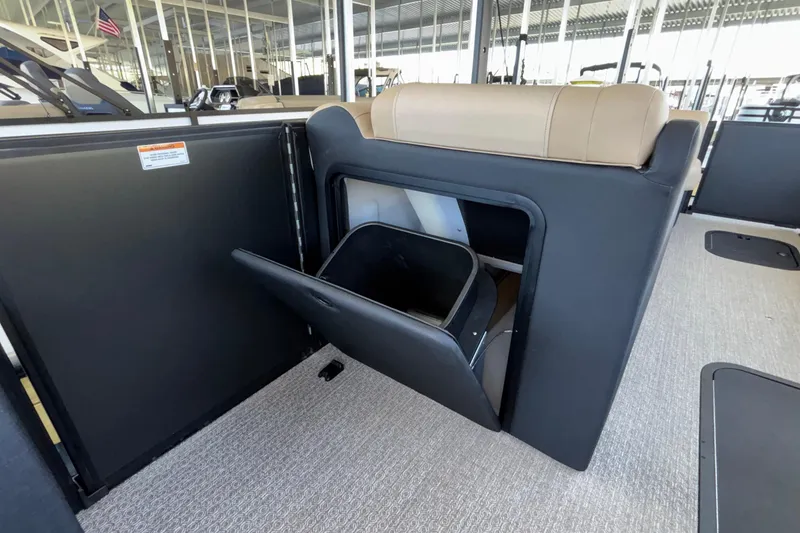 Slide: The Image of Interior of 2026 Evotti 525QL boat with storage compartment open. - 37