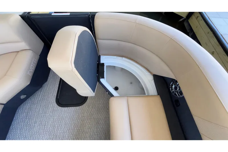 Slide: The Image of Luxurious seating area in 2026 Evotti 525QL boat with storage compartment. - 39