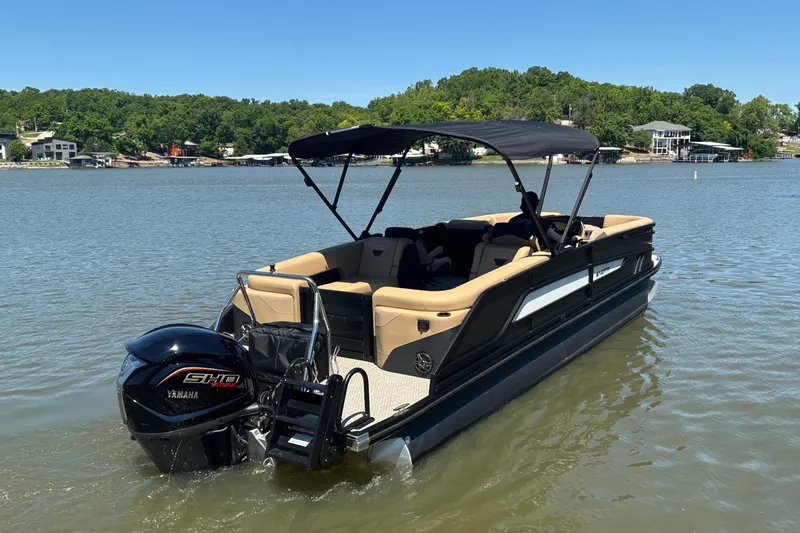 Slide: The Image of 2026 Evotti 525QL pontoon boat on a lake with Yamaha engine. - 4