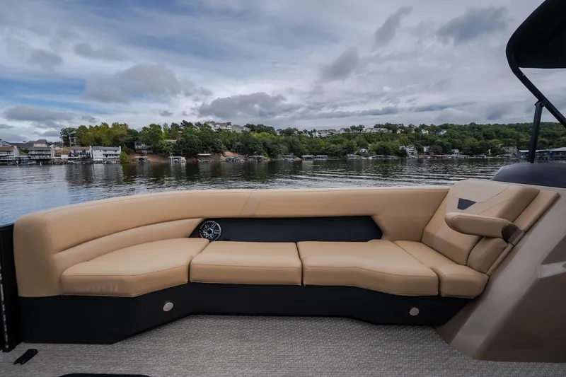 Slide: The Image of Luxurious seating on 2026 Evotti 525QL boat with scenic lake view. - 17