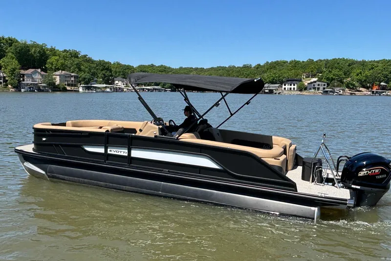 Slide: The Image of 2026 Evotti 525QL pontoon boat on a lake, featuring a Yamaha engine and canopy. - 7