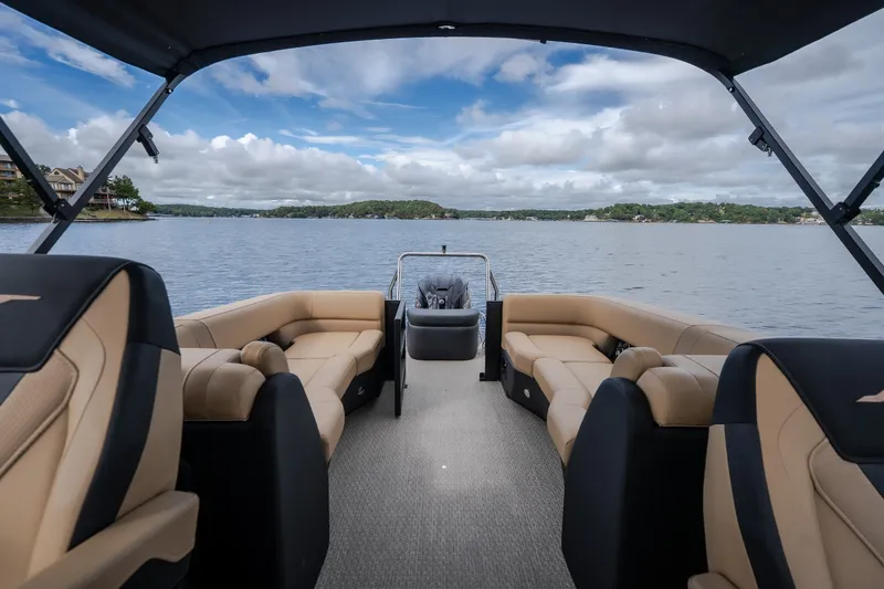 Slide: The Image of Luxurious 2026 Evotti 525QL pontoon boat interior with scenic lake view. - 50