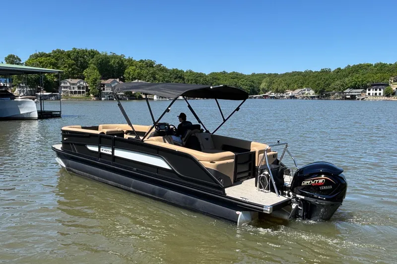 Slide: The Image of Evotti 525QL pontoon boat on a lake, 2026 model, featuring Yamaha engine. - 8
