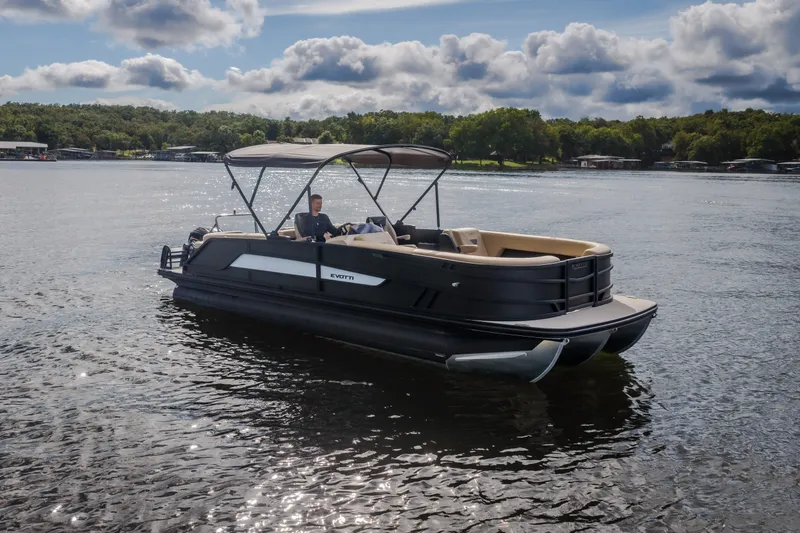 Slide: The Image of 2026 Evotti 525QL pontoon boat on a serene lake under a cloudy sky. - 77