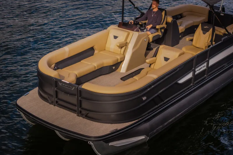 Slide: The Image of 2026 Evotti 525QL luxury pontoon boat with beige seating on water. - 23