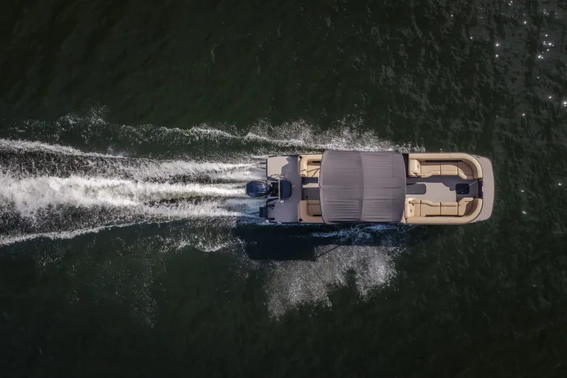 Slide: The Image of Aerial view of 2026 Evotti 525QL boat cruising on water. - 76