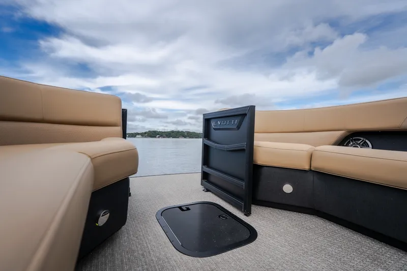 Slide: The Image of Luxurious Evotti 525QL boat interior, 2026 model, with beige seating and scenic water view. - 15