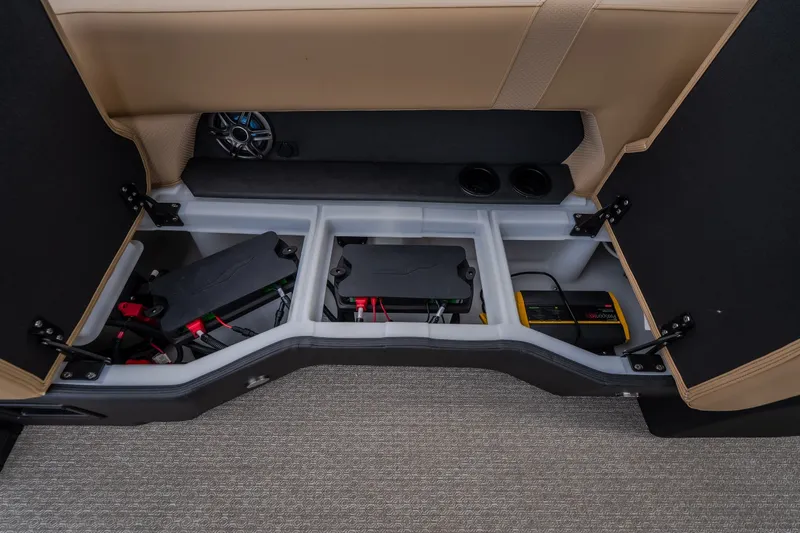 Slide: The Image of Under-seat storage in 2026 Evotti 525QL, featuring organized compartments and audio equipment. - 52