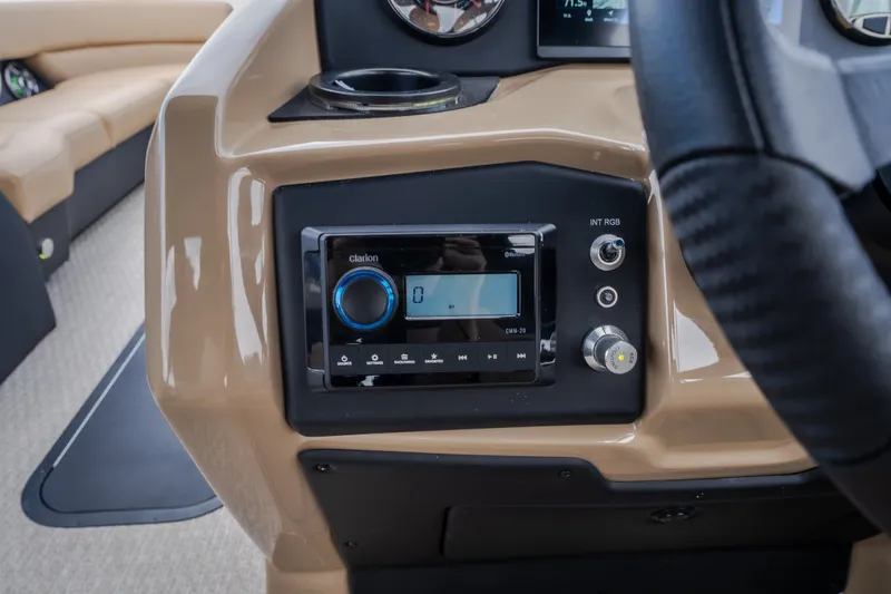 Slide: The Image of Dashboard of 2026 Evotti 525QL boat with audio controls and steering wheel. - 34