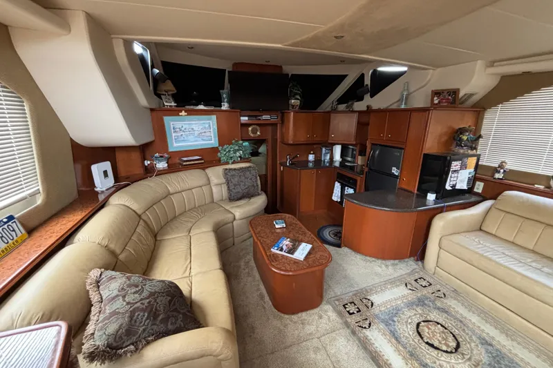 Slide: The Image of Luxurious interior of a 2007 Silverton 43 Motor Yacht with elegant furnishings and modern amenities. - 15