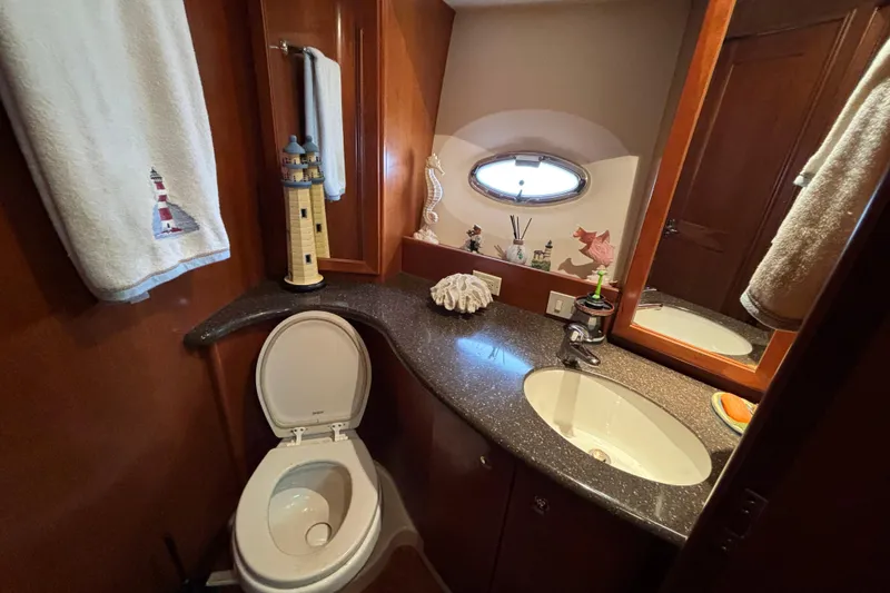 Slide: The Image of Luxurious bathroom in 2007 Silverton 43 Motor Yacht with elegant fixtures and decor. - 24