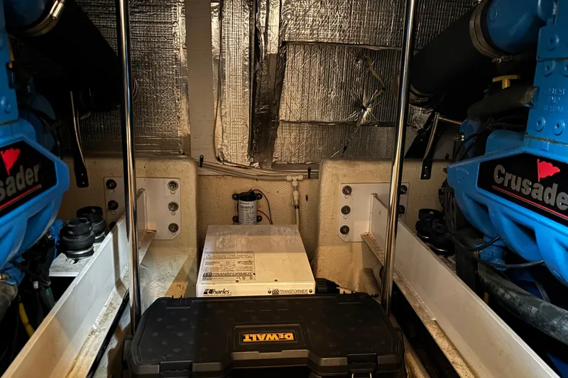 Slide: The Image of Engine room of 2007 Silverton 43 Motor Yacht with Crusader engines and tools. - 29