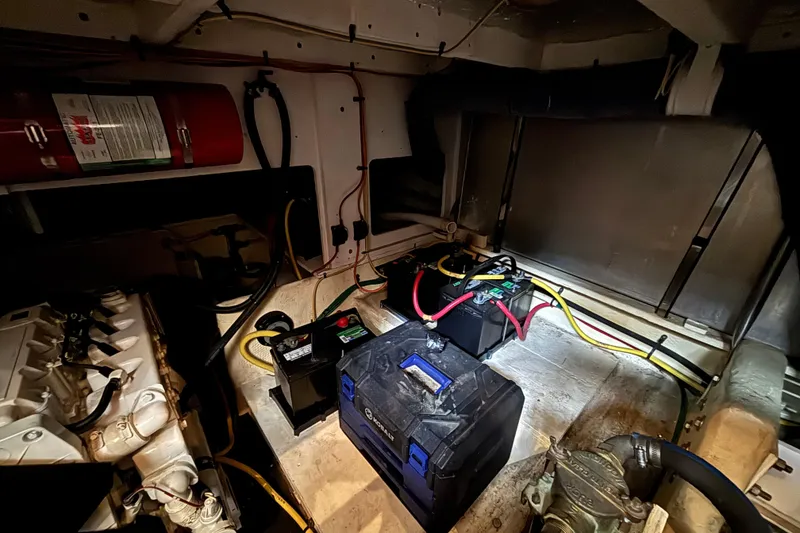 Slide: The Image of Engine room of 2007 Silverton 43 Motor Yacht with batteries and wiring. - 31