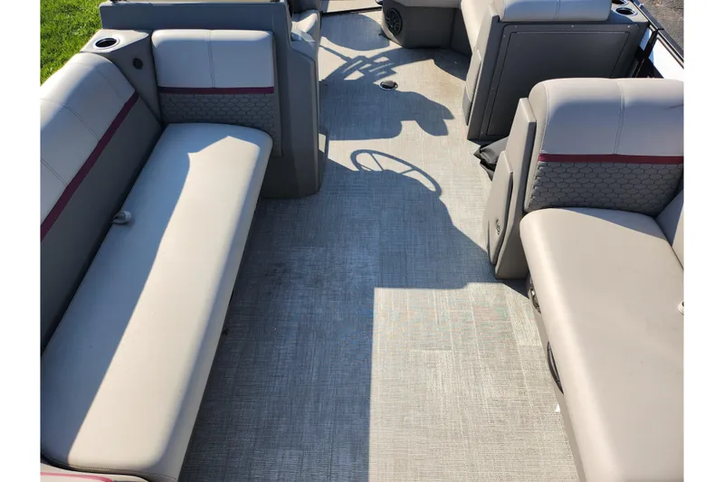 Slide: The Image of 2024 Qwest Angler Qwest XRE boat interior with spacious seating and modern design. - 10