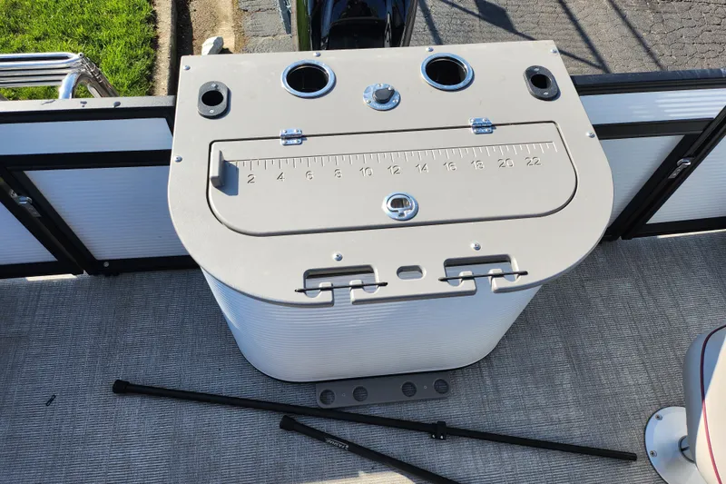Slide: The Image of 2024 Qwest Angler Qwest XRE boat with integrated fishing station and measurement ruler. - 16