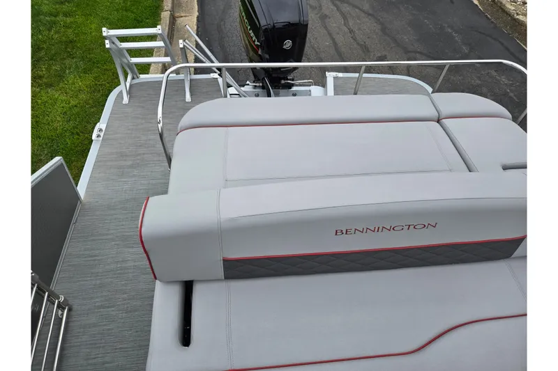 Slide: The Image of 2023 Bennington 22 LSB pontoon boat with sleek seating and modern design. - 16