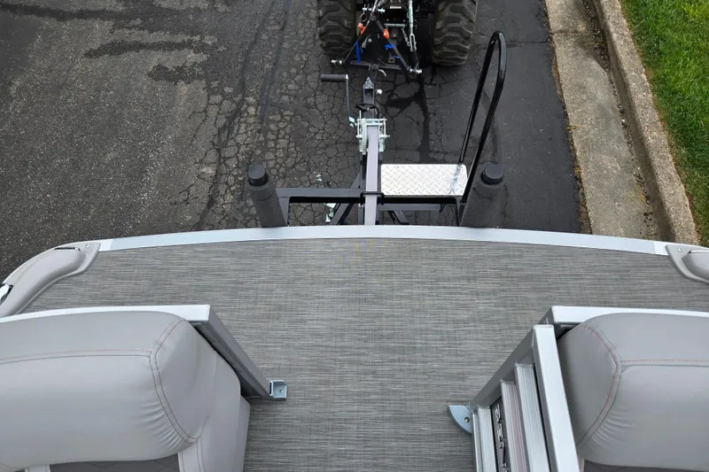 Slide: The Image of 2023 Bennington 22 LSB pontoon boat on trailer, viewed from above. - 23