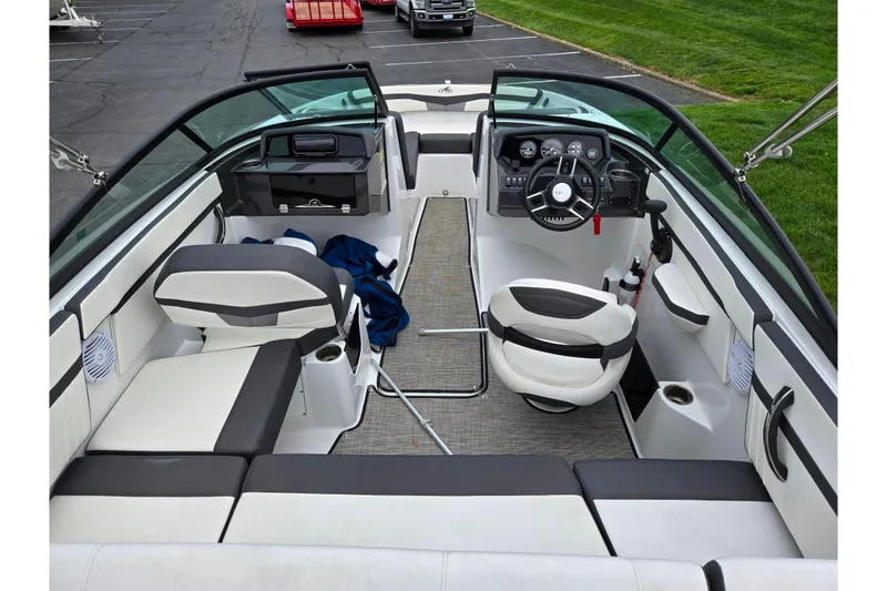 Slide: The Image of Interior of a 2020 Monterey M-20 boat with seating and steering wheel. - 10