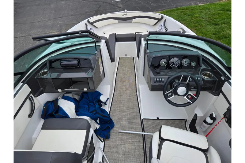 Slide: The Image of Interior view of a 2020 Monterey M-20 boat, featuring dashboard and seating area. - 11