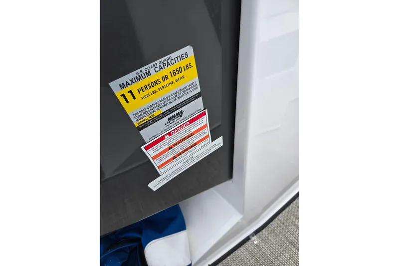 Slide: The Image of Capacity label on 2020 Monterey M-20 boat, indicating maximum 11 persons or 1650 lbs. - 15