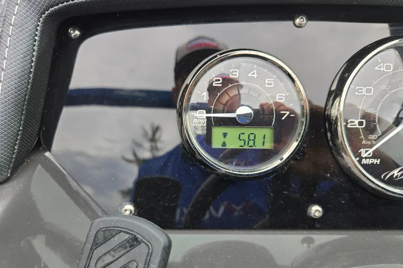 Slide: The Image of Dashboard of a 2020 Monterey M-20 boat showing RPM and speed gauges. - 16