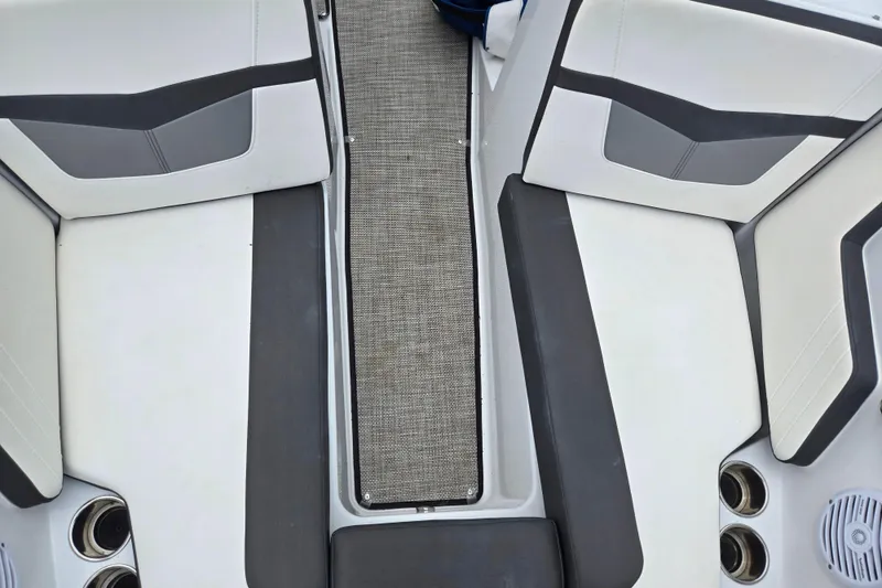 Slide: The Image of Interior seating of a 2020 Monterey M-20 boat with modern design and cup holders. - 19
