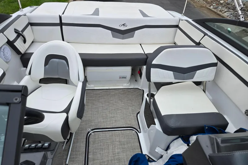 Slide: The Image of Interior of a 2020 Monterey M-20 boat with white and gray seating. - 21