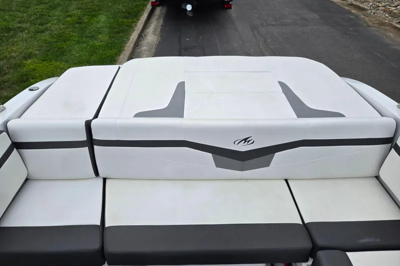 Slide: The Image of 2020 Monterey M-20 boat with sleek white and gray seating design. - 23