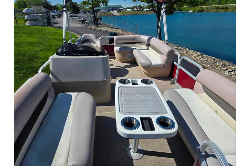 Slide: The Image of 2014 Sun Tracker Party Barge 20 DLX pontoon boat with spacious seating and table. - 14