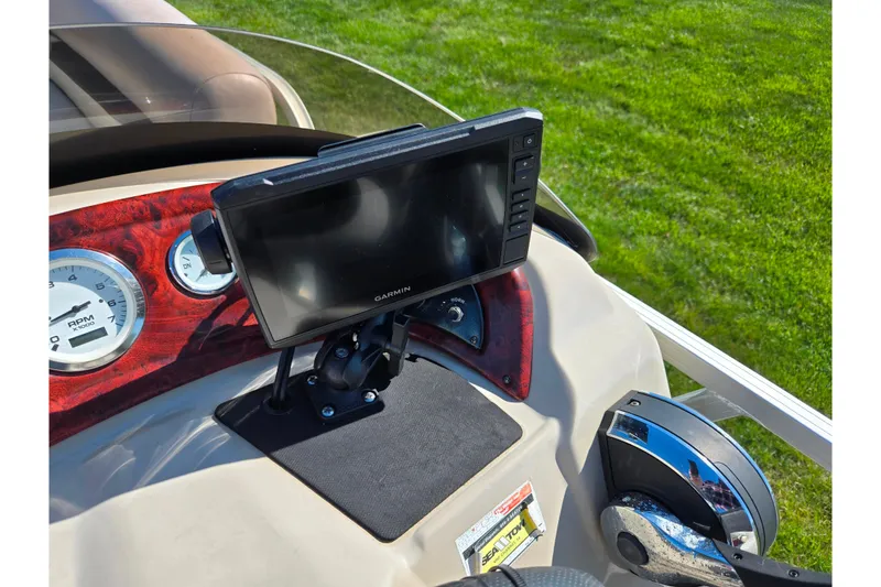 Slide: The Image of Dashboard of 2014 Sun Tracker Party Barge 20 DLX with Garmin GPS and controls. - 23
