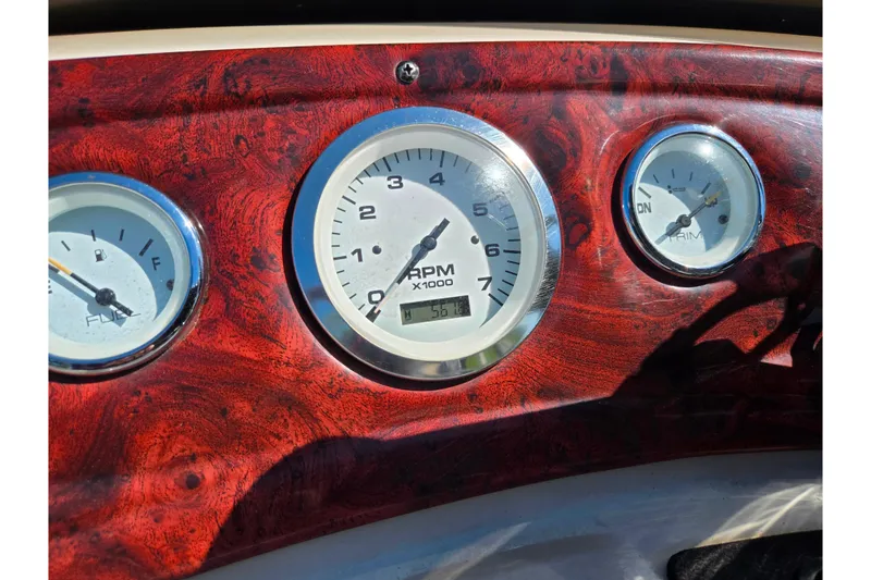 Slide: The Image of Dashboard gauges of a 2014 Sun Tracker Party Barge 20 DLX boat. - 24