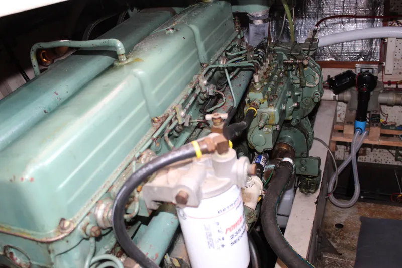 Slide: The Image of Engine room of a 1971 Grand Banks 36 Classic boat, showcasing detailed machinery. - 30