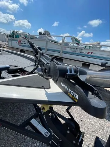 Slide: The Image of 2022 Tracker 175 TXM boat with Minn Kota motor, sunny day. - 3