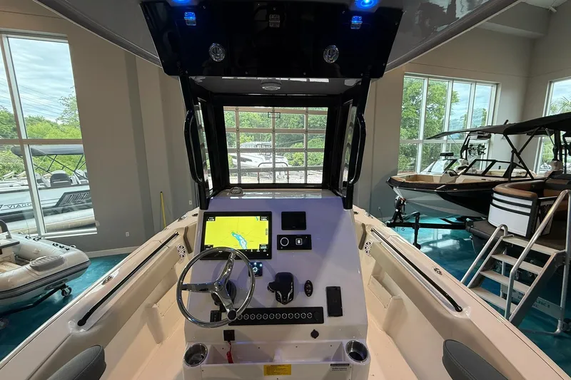Slide: The Image of Interior view of 2026 Key West 249 FS boat with modern navigation system. - 13